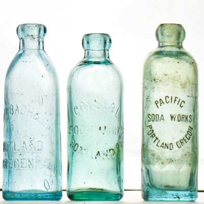 SEVEN PORTLAND, OREGON GLASS BOTTLES