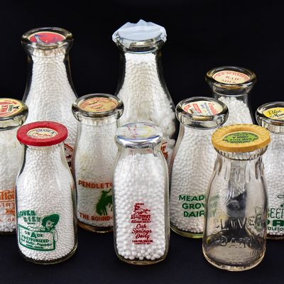 PINT-SIZED ASSORTMENT OF GLASS AMERICAN DAIRY BOTTLES