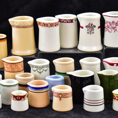 32 ASSORTED RESTAURANT-WARE CREAMERS: HOMER LAUGHLIN, BUFFALO CHINA, HALL, AND MORE