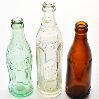 TRIO OF SODA BOTTLES: COCA COLA AND BIG CHIEF