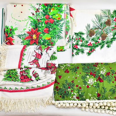 FIVE VINTAGE CHRISTMAS TABLECLOTHS