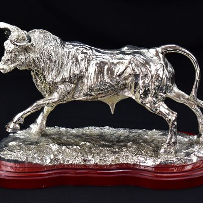 JOYA SUR SILVER-PLATED CHARGING BULL STATUE