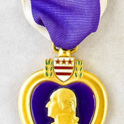 PURPLE HEART AWARDED TO WWII BOMBER TECHNICAL SGT. RAYMOND G. MOFFETT