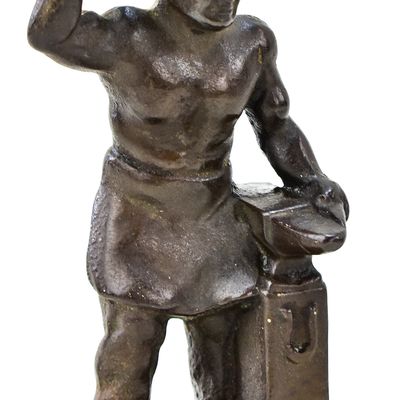 "BLACKSMITH AT THE ANVIL" FIGURINE; LITTLESTOWN HARDWARE AND FOUNDRY