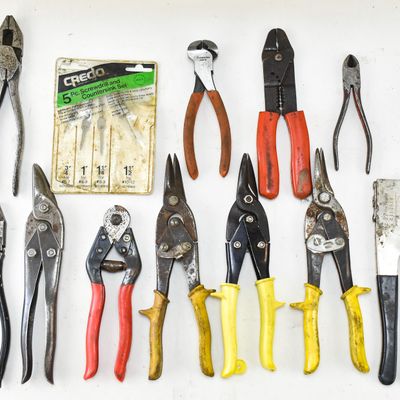 20TH CENTURY TOOL ASSORTMENT: WIRE CUTTERS, TIN SNIPS, RIVETER, AND MORE