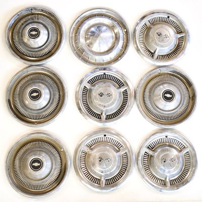 ASSORTMENT OF CHEVEROLET HUBCAPS; TWO FULL SETS