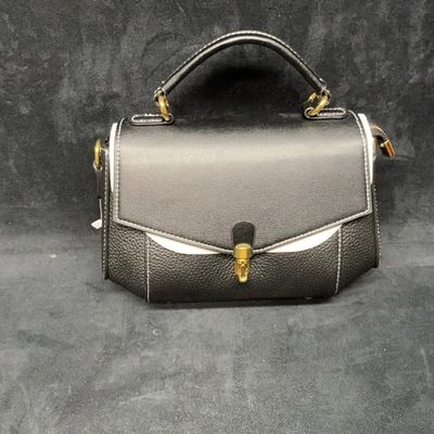 Sale Photo Thumbnail #148: Black Leather-Style Handbag With Gold Trim