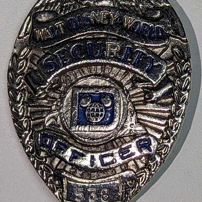 Sale Photo Thumbnail #405: Early 1980s Disney World Female Security Badge 538