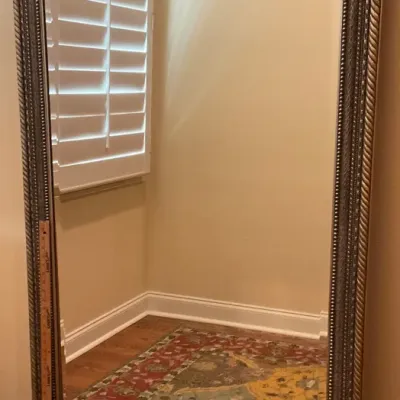 Sale Photo Thumbnail #17: Large rectangular floor mirror featuring a beveled edge and a textured, metallic-finished frame with rope-twist detailing.