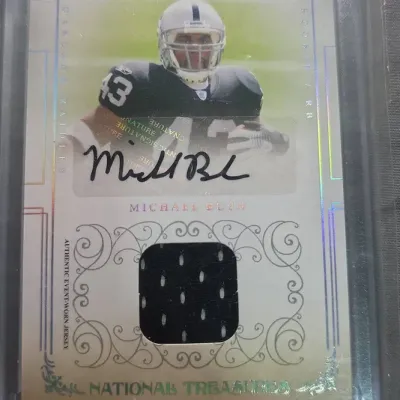 2007 National Treasures Michael Bush Rookie Autograph Jersey Raiders 13/49