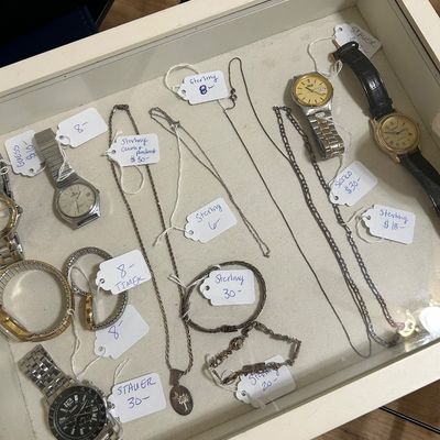 Sale Photo Thumbnail #180: Vintage watches and a few pieces of sterling silver jewelry. 
