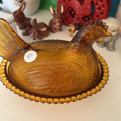 Sale Photo Thumbnail #128: Vintage amber glass hen-on-nest covered dish with a beaded rim. 