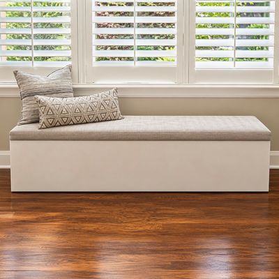 Sale Photo Thumbnail #6: CB2 Modern white window bench with a neutral upholstered cushion top and two patterned accent pillows.