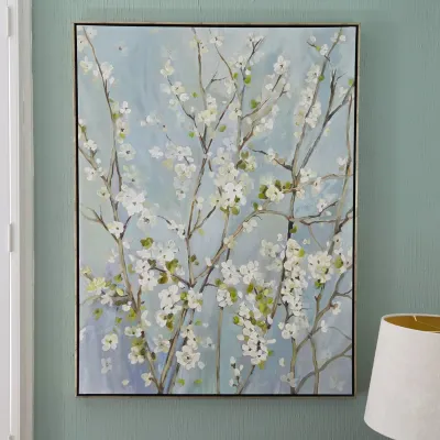 Sale Photo Thumbnail #27: Large canvas wall art depicting flowering cherry or dogwood branches against a pale blue background, presented in a thin silver frame.
