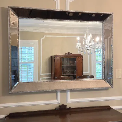 Sale Photo Thumbnail #38: Large rectangular wall mirror featuring a mirrored, angled frame lined with beaded trim detailing.