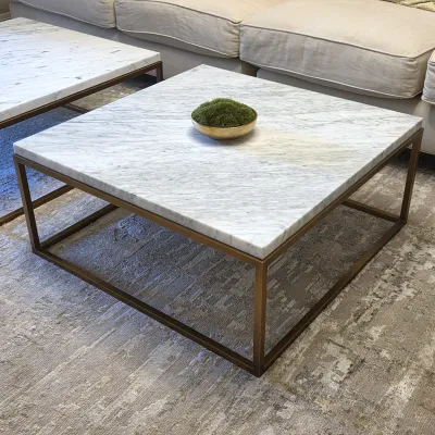 Sale Photo Thumbnail #115: Restoration Hardware Modern square coffee table featuring a thick white marble top set on a minimalist bronze-finished metal base.