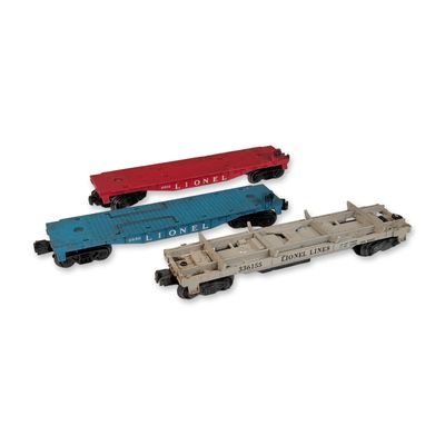 Three Lionel Postwar Trains O-Gauge 3361 Lumber Car, 6816 Flat Car & 6830 Flat w/ Submarine