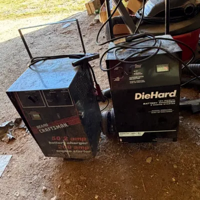 Sale Photo Thumbnail #70: Vintage Sears Craftsman 50/2 amp battery charger and 200 amp engine starter alongside a DieHard 12V manual battery charger and engine starter