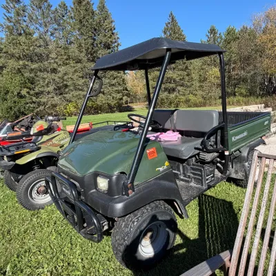 Sale Photo Thumbnail #12: Green Kawasaki Mule 3010 utility vehicle