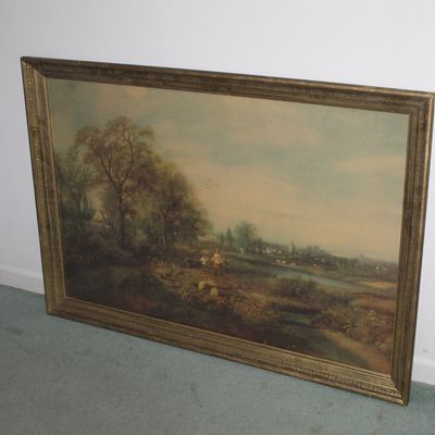 Sale Photo Thumbnail #41: Large framed landscape print depicting a pastoral scene with figures, trees, and a river, housed in a gilded wood frame.
