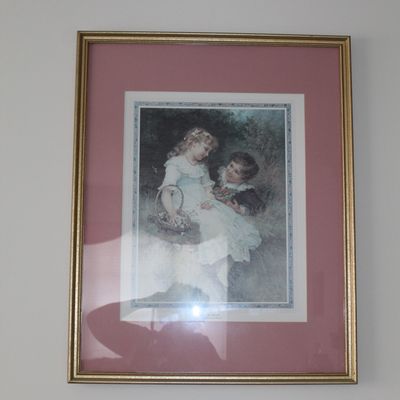 Sale Photo Thumbnail #19: Framed vintage print depicting a young boy and girl in a garden, set in a dusty rose mat and a gilded frame.