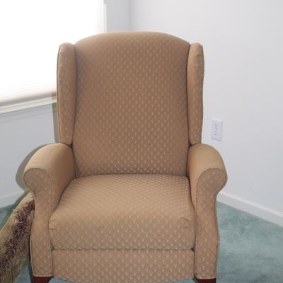 Sale Photo Thumbnail #17: Traditional wingback armchair upholstered in a tan diamond-patterned fabric, featuring cabriole front legs with a cherry finish.