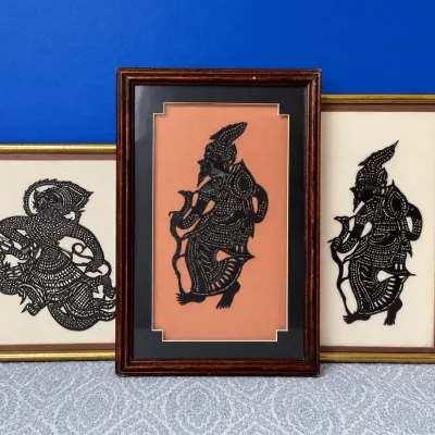Framed Southeast Asian Shadow Puppet–Style Artwork.