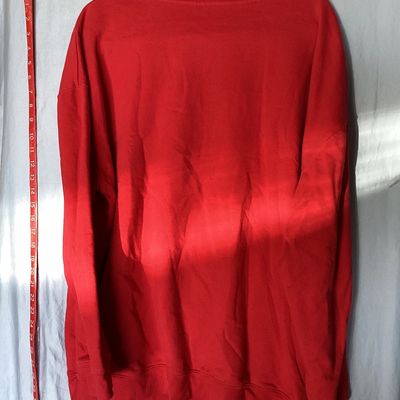 Sale Photo Thumbnail #463: Red crewneck Disney sweatshirt featuring a graphic print of Minnie Mouse in a scarf and skirt with a flower hat. Size tag states 1X. Made of a cotton blend. Shows light wear consistent with pre-owned condition, including some loose threads near the bottom