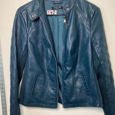 Sale Photo Thumbnail #509: Women's teal blue faux leather moto-style jacket by Baccini. Features a front zip closure, snap collar, quilted details on sleeves and shoulders, stretchy knit side panels, and zippered cuffs. Fully lined. Appears to be in good condition. Women’s medium