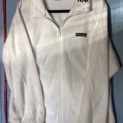 Sale Photo Thumbnail #454: White full-zip soft fleece jacket by Columbia Sportswear Company. Features a high collar, full front zipper, embroidered Columbia patch logo on the chest, and elastic cuffs. Tag size is XXL, made in Vietnam. Measures approximately 26 inches in length from