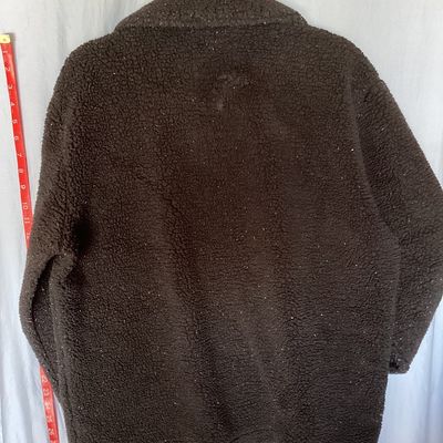 Sale Photo Thumbnail #426: Hollister California fleece sherpa jacket in men's size Large. Features a dark black fabric with white flecked detailing throughout, front snap/button closure, chest patch pocket, side hand pockets, and a collared neckline. Appears to be in good pre-owned