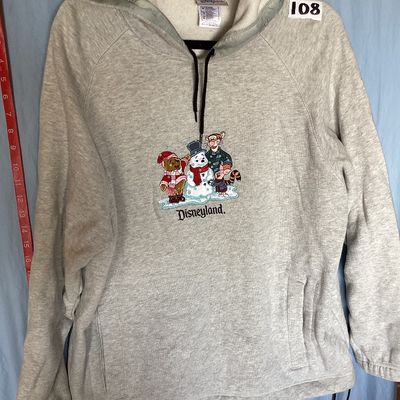 Sale Photo Thumbnail #444: Disneyland Resort hooded sweatshirt featuring an embroidered front design of Winnie the Pooh, Tigger, Piglet, and a snowman with 'Disneyland' embroidered below. Features front side-entry pockets, a fleece-lined hood with drawstring, and an adjustable draw