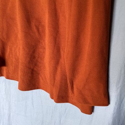 Sale Photo Thumbnail #475: Women's long sleeve cowl neck knit top by D&Co. Essentials in burnt orange. Features a waffle knit texture. Size US 1X  Made in Vietnam. Measures approximately 28 inches in length. In good condition with no visible tears or major stains.