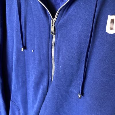 Sale Photo Thumbnail #436: Isaac Mizrahi Live! women's full-zip hooded jacket in royal blue. Features a soft plush fleece interior lining, front patch pockets, drawstring hood, and split hem. Size US XL. Made in Vietnam. Measures approximately 29 inches in length. In good pre-owned