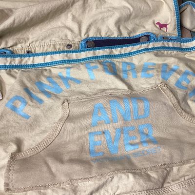 Sale Photo Thumbnail #505: Vintage Victoria's Secret PINK canvas messenger shoulder bag in cream, navy, and teal accents. Features Y2K style embroidered graphics, felt patches ('Live in 86 Pink'), appliqué detailing, multiple interior snap-in zip pouches, and an adjustable shoulde