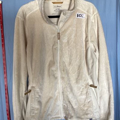 Sale Photo Thumbnail #476: L.L. Bean women's full-zip plush fleece jacket in cream. Made from 100% recycled polyester. Features zipper hand pockets and tan accent zipper pulls. Length measures approximately 27-28 inches. Overall good pre-owned condition with some minor discoloratio