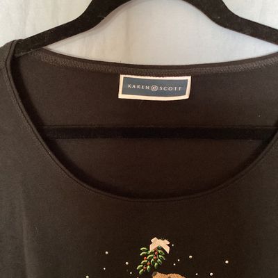 Sale Photo Thumbnail #385: Karen Scott black long-sleeve knit top featuring an embellished holiday graphic on the front depicting a cat on a step ladder and a dog under mistletoe, decorated with glitter, beads, and rhinestones. Includes scoop neck style. Appears in good overall pre