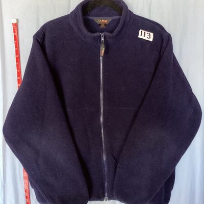 Sale Photo Thumbnail #418: L.L. Bean Outdoors dark navy blue full-zip fleece jacket. Features a high collar, zipper front with L.L. Bean pull tab, and side hand pockets. Made from 100% polyester fleece. Shows light pre-owned wear with minimal pilling and no major flaws visible. Tot