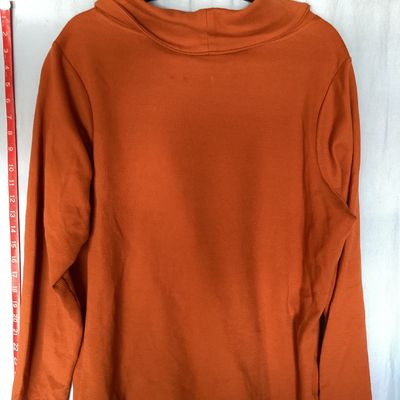 Sale Photo Thumbnail #472: Women's long sleeve cowl neck knit top by D&Co. Essentials in burnt orange. Features a waffle knit texture. Size US 1X  Made in Vietnam. Measures approximately 28 inches in length. In good condition with no visible tears or major stains.