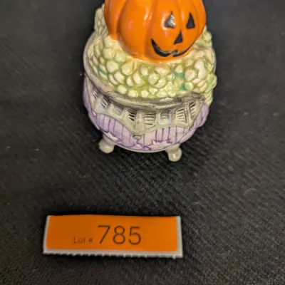 cauldron-shaped salt or pepper shaker with a jack-o'-lantern lid from the Fitz and Floyd Kitty Witches Halloween collection