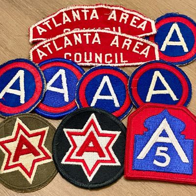 Sale Photo Thumbnail #252: Collection of vintage embroidered patches, including Boy Scouts of America Atlanta Area Council arcs and various military-style "A" insignia patches.