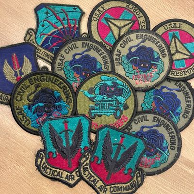 Sale Photo Thumbnail #251: Collection of vintage United States Air Force embroidered patches, including USAF Civil Engineering Prime Beef and Tactical Air Command designs.
