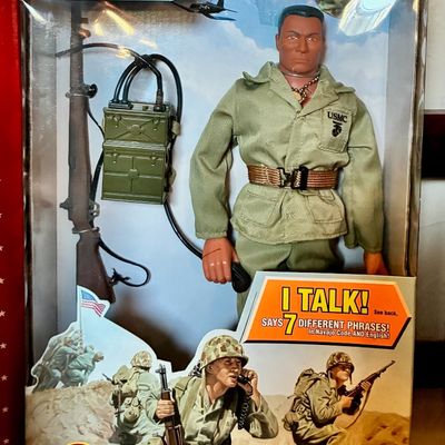 Sale Photo Thumbnail #14: Vintage Hasbro G.I. Joe Navajo Code Talker action figure, new in original box, featuring a talking mechanism and authentic WWII-era USMC accessories.