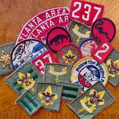 Sale Photo Thumbnail #87: Collection of vintage Boy Scouts of America patches, including Atlanta Area council strips, troop numbers, and various merit and rank badges.