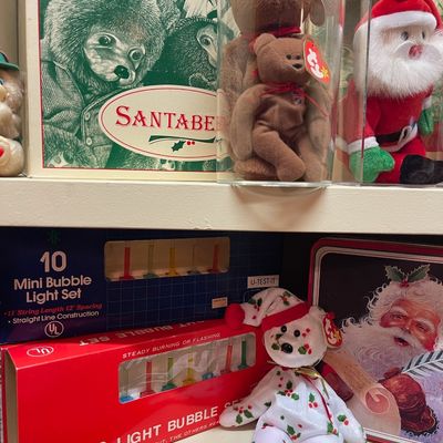 Sale Photo Thumbnail #169: Vintage holiday collectibles including Ty Beanie Babies, a Santabear box, a Santa Claus tin, and two boxes of vintage 10-light bubble light sets.