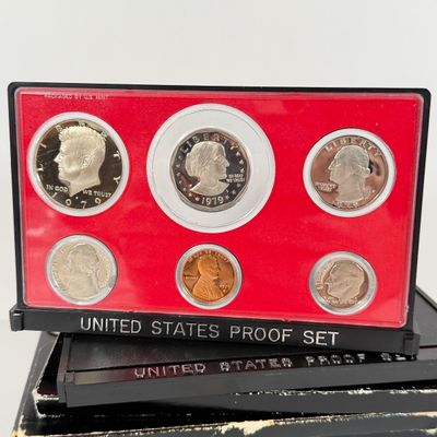 LOT 52: United States Mint Proof Sets - 1970s - Condition of Cases Varies