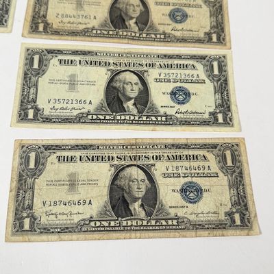 LOT 25: One Dollar U.S. Silver Certificate Bills (10) 1957