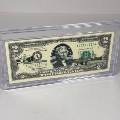 LOT 33: Collection of Ten Vintage $2 Bills with Aftermarket Art Depicting U.S. States in Cases - Ohio, Vermont, Indiana and More