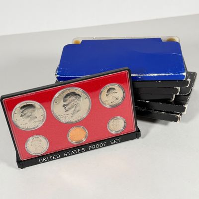 LOT 56: United States Mint Proof Sets - 1970s - Cases in Varrying Condition