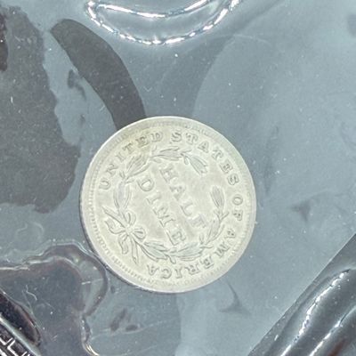 LOT 75: Collection of Seated Liberty US Dimes and More